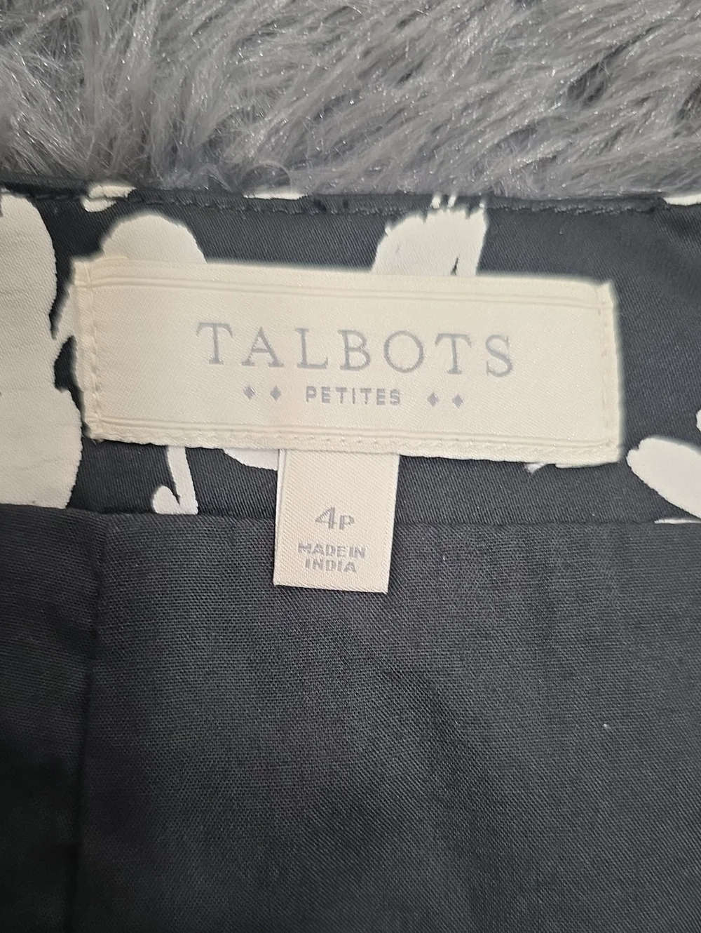 Talbots- Black Mini Skirt with White Floral Print. Size 4P. EUC